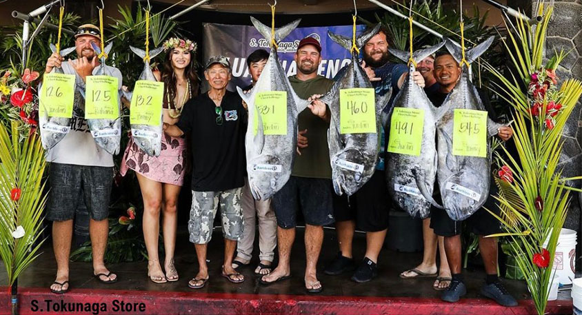 People celebrate with fish result